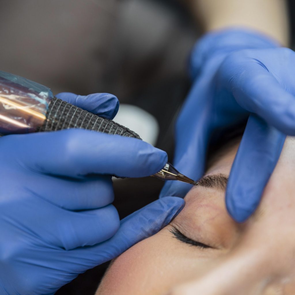 beautician-doing-eyebrow-treatment-her-female-client-scaled.jpg beautician-doing-eyebrow-treatment-her-female-client-scaled.jpg